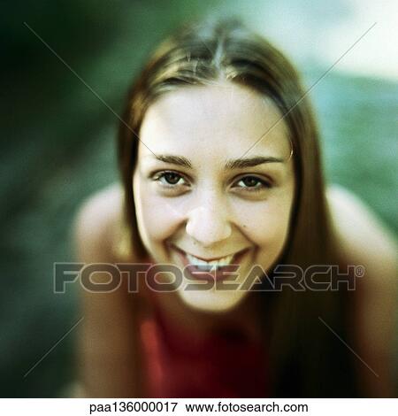 Stock Photo - Portrait of girl, high angle view. Fotosearch