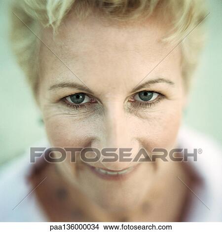 Portrait of mature woman, high angle view View Large Photo Image Picture - Portrait of mature woman, high angle view. Fotosearch