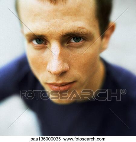 Stock Photography - Portrait of young man. Fotosearch