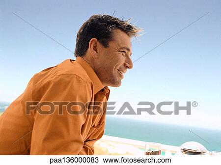 Profile of man at the beach View Large Photo Image Stock Image - Profile of man at the beach. Fotosearch