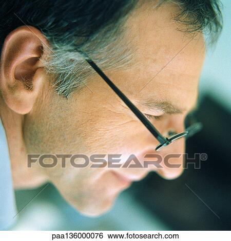 Profile of man wearing glasses View Large Photo Image Stock Photograph - Profile of man wearing glasses. Fotosearch