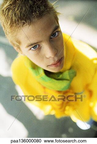Teenage boy, high angle view, portrait View Large Photo Image Stock Image - Teenage boy, high angle view, portrait. Fotosearch