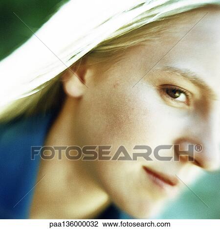Stock Image - Teenage girl, partial view, portrait. Fotosearch