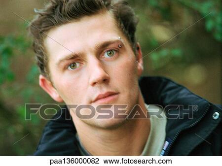 Stock Image - Young man, portrait. Fotosearch