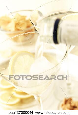 Cocktails with slice of lemon. View Large Photo Image Picture - Cocktails with slice of lemon.. Fotosearch