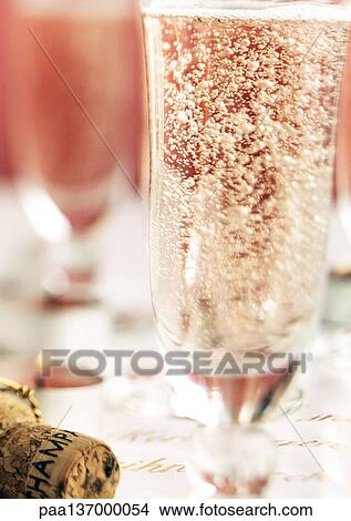 Glass of Champagne, close-up. View Large Photo Image Picture - Glass of Champagne, close-up.. Fotosearch