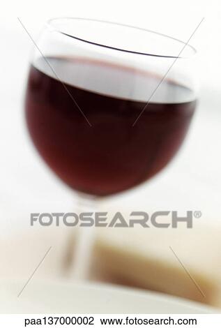 Glass of red wine. View Large Photo Image Stock Image - Glass of red wine.. Fotosearch