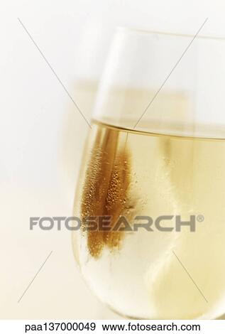 Glass of white wine, close-up. View Large Photo Image Stock Photo - Glass of white wine, close-up.. Fotosearch