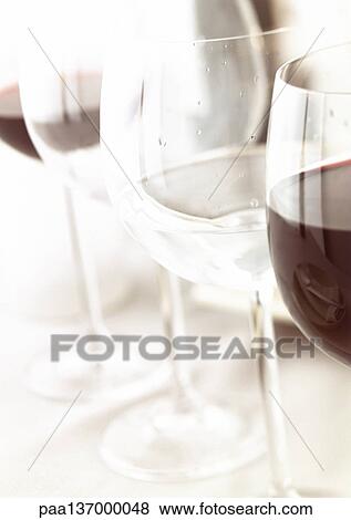 Glasses of red wine and water, close-up. View Large Photo Image Stock Photo - Glasses of red wine and water, close-up.. Fotosearch