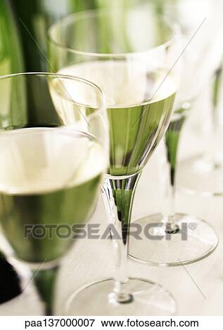 Stock Photo - Glasses of white wine.. Fotosearch