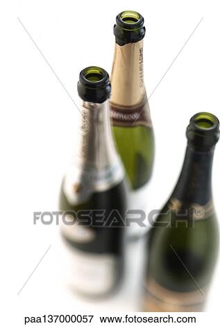 Stock Photo - Three bottles of Champagne.. Fotosearch