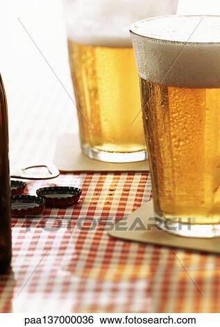 Stock Photograph - Two glasses of beer.. Fotosearch