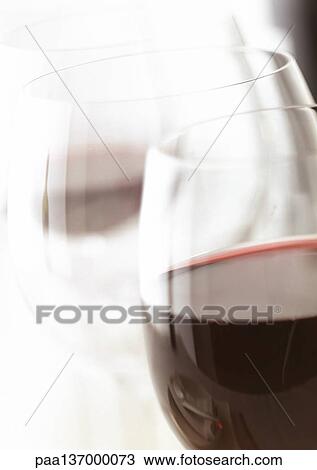 Two glasses of red wine, close-up. View Large Photo Image Stock Image - Two glasses of red wine, close-up.. Fotosearch