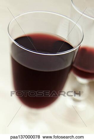 Stock Photo - Two glasses of red wine.. Fotosearch