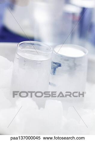 Two glasses of Vodka on ice. View Large Photo Image Stock Photography - Two glasses of Vodka on ice.. Fotosearch