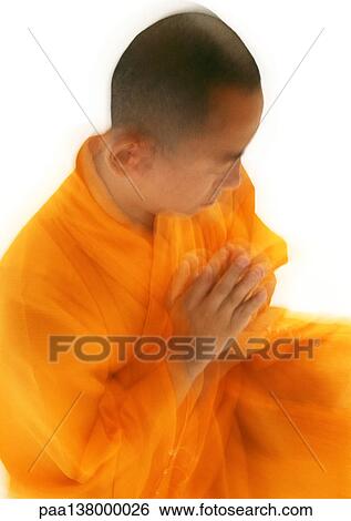 Buddhist monk meditating, blurred, high angle view View Large Photo Image Stock Photograph - Buddhist monk meditating, blurred, high angle view. Fotosearch