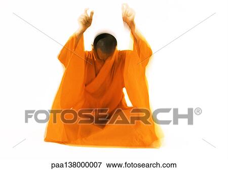 Buddhist monk meditating, blurred motion View Large Photo Image Stock Photo - Buddhist monk meditating, blurred motion. Fotosearch