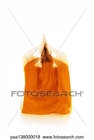 Buddhist monk meditating, blurred motion View Large Photo Image Stock Photo - Buddhist monk meditating, blurred motion. Fotosearch