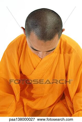 Buddhist monk meditating, high angle view View Large Photo Image Stock Photo - Buddhist monk meditating, high angle view. Fotosearch