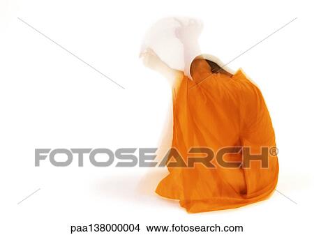 Buddhist monk meditating, side view, blurred motion View Large Photo Image Picture - Buddhist monk meditating, side view, blurred motion. Fotosearch
