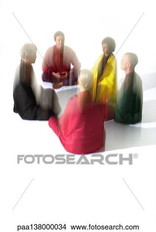 Group of people sitting on floor indian style, meditating, blurred View Large Photo Image Picture - Group of people sitting on floor indian style, meditating, blurred. Fotosearch
