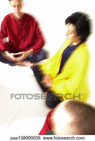 Group of people sitting on floor indian style, meditating, blurred View Large Photo Image Stock Photography - Group of people sitting on floor indian style, meditating, blurred. Fotosearch
