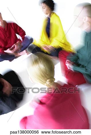 People sitting on floor in lotus position, meditating, blurred View Large Photo Image Stock Photograph - People sitting on floor in lotus position, meditating, blurred. Fotosearch