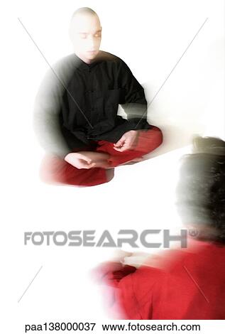People sitting on floor indian style, meditating, blurred View Large Photo Image Stock Photo - People sitting on floor indian style, meditating, blurred. Fotosearch