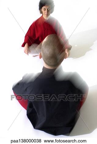 People sitting on floor indian style, meditating, blurred View Large Photo Image Stock Photo - People sitting on floor indian style, meditating, blurred. Fotosearch