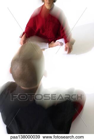People sitting on floor indian style, meditating, blurred View Large Photo Image Stock Photo - People sitting on floor indian style, meditating, blurred. Fotosearch