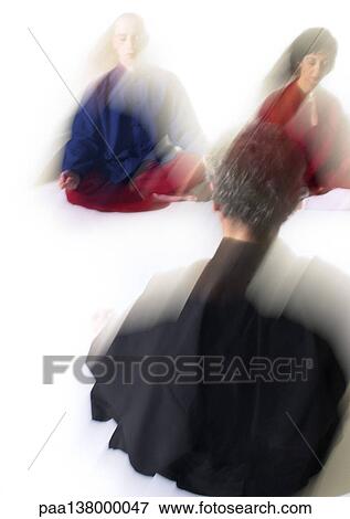 People sitting on floor indian style, meditating, blurred View Large Photo Image Stock Photo - People sitting on floor indian style, meditating, blurred. Fotosearch