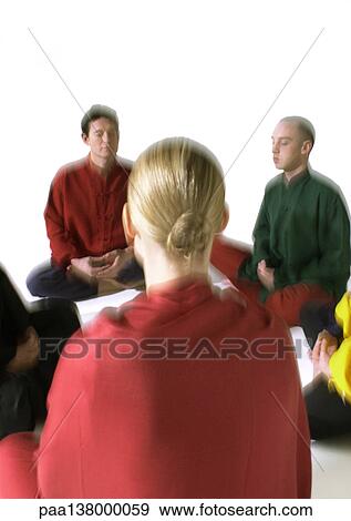 People sitting on floor, meditating, blurred View Large Photo Image Stock Photo - People sitting on floor, meditating, blurred. Fotosearch