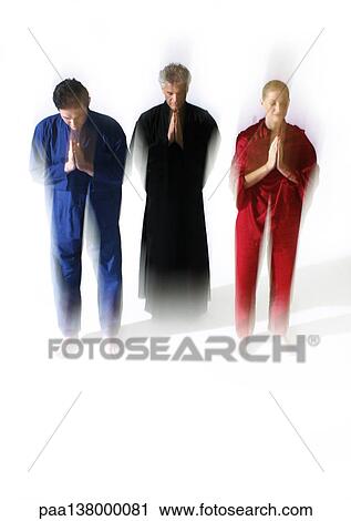 Three people standing with hands together and eyes closed, blurred View Large Photo Image Stock Image - Three people standing with hands together and eyes closed, blurred. Fotosearch