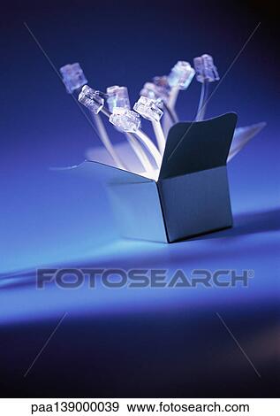 Computer plugs sticking out of box. View Large Photo Image Stock Photo - Computer plugs sticking out of box.. Fotosearch
