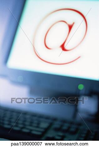 Computer screen with "@" symbol, blurred. View Large Photo Image Stock Photo - Computer screen with "@" symbol, blurred.. Fotosearch