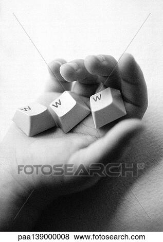 Hand holding WWW computer keys, b&w. View Large Photo Image Stock Photo - Hand holding WWW computer keys, b&w.. Fotosearch