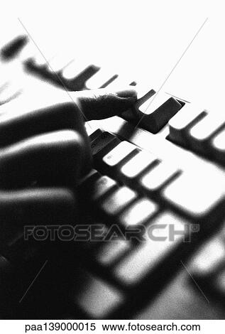 Hand on computer keyboard, close-up, b&w. View Large Photo Image Stock Photography - Hand on computer keyboard, close-up, b&w.. Fotosearch