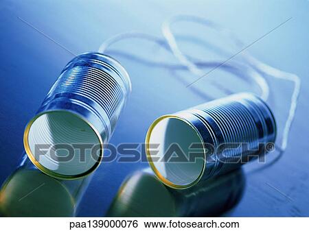 Two metal cans connected with string. View Large Photo Image Stock Photograph - Two metal cans connected with string.. Fotosearch