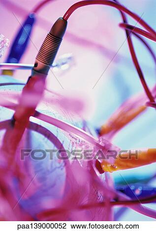 World globe connected with wires and plugs, close-up. View Large Photo Image Stock Image - World globe connected with wires and plugs, close-up.. Fotosearch