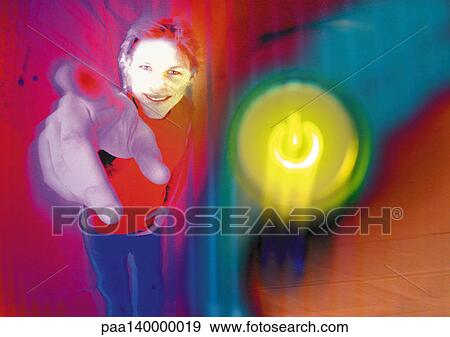 Young man smiling, pointing toward camera, digital composite. View Large Illustration Stock Illustration - Young man smiling, pointing toward camera, digital composite.. Fotosearch
