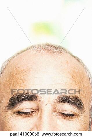 Mature man, close-up of upper face. View Large Photo Image Stock Photo - Mature man, close-up of upper face.. Fotosearch