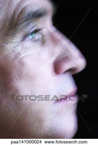 Mature man, close-up, side view, blurred View Large Photo Image Picture - Mature man, close-up, side view, blurred. Fotosearch