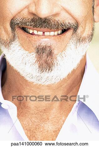 Mature man smiling, close-up of lower face View Large Photo Image Stock Image - Mature man smiling, close-up of lower face. Fotosearch