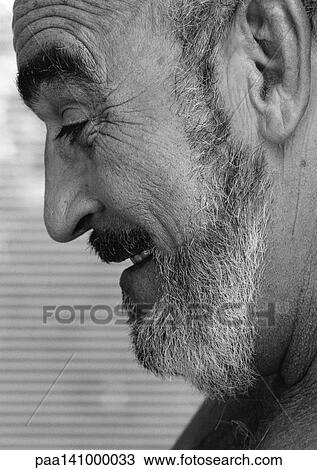 Mature man smiling, side view, close-up, b&w. View Large Photo Image Stock Image - Mature man smiling, side view, close-up, b&w.. Fotosearch