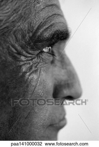 Stock Image - Mature man's face, side view, close-up, b&w.. Fotosearch