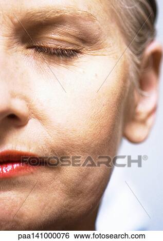 Mature woman, eyes closed, close-up of one side of face. View Large Photo Image Stock Photograph - Mature woman, eyes closed, close-up of one side of face.. Fotosearch