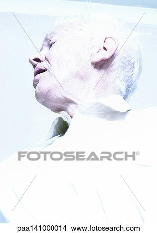 Senior man, low angle view, portrait. View Large Photo Image Picture - Senior man, low angle view, portrait.. Fotosearch