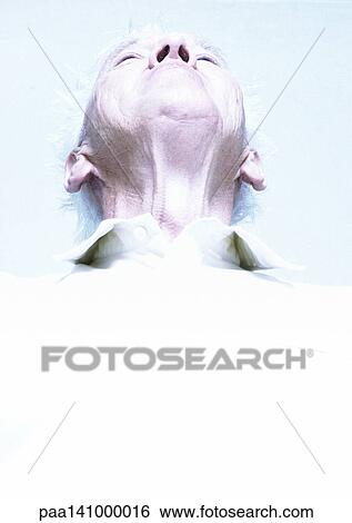Senior man, low angle view, portrait. View Large Photo Image Stock Photograph - Senior man, low angle view, portrait.. Fotosearch