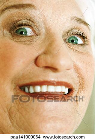Senior woman smiling, close-up. View Large Photo Image Picture - Senior woman smiling, close-up.. Fotosearch