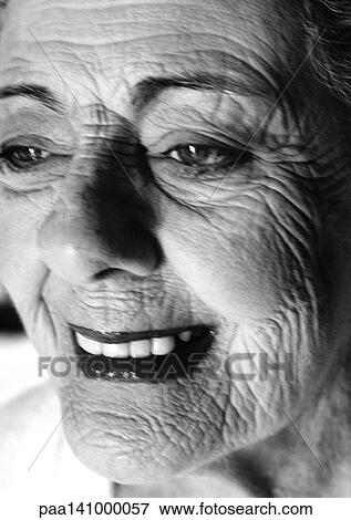 Senior woman smiling, side view, close-up, b&w. View Large Photo Image Stock Photo - Senior woman smiling, side view, close-up, b&w.. Fotosearch